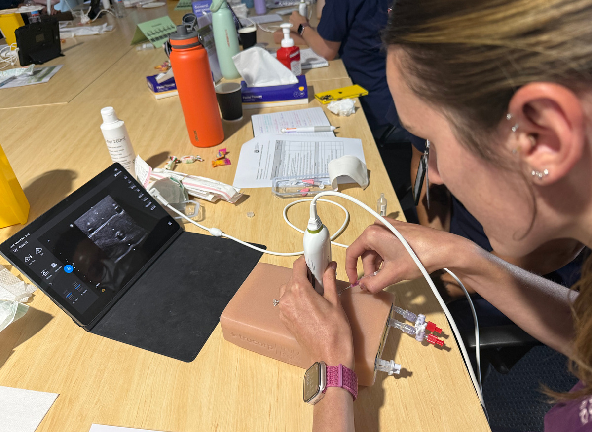 Attendees enjoying the practical nature of the workshop